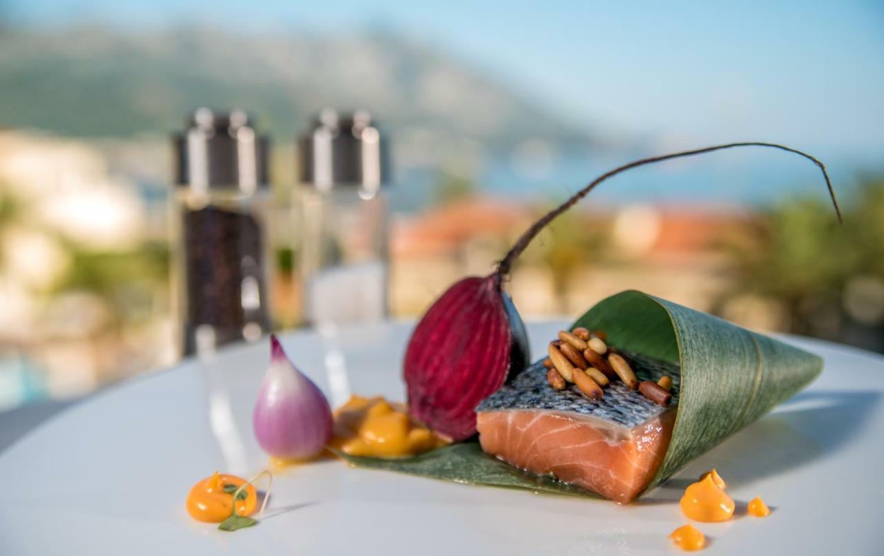 Splendid Conference & Spa Resort Budva Bagian luar foto Salmon prepared with the traditional method of smoking in Norway